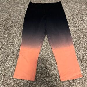 Nike black and pink ombré athletic capris.